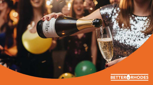 Pouring a sparkling non-alcoholic drink at a New Year’s Eve party