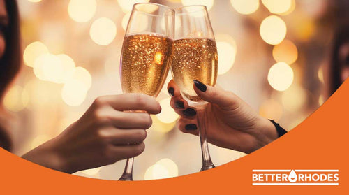 Clinking glasses of sparkling non-alcoholic drinks for a New Year’s toast