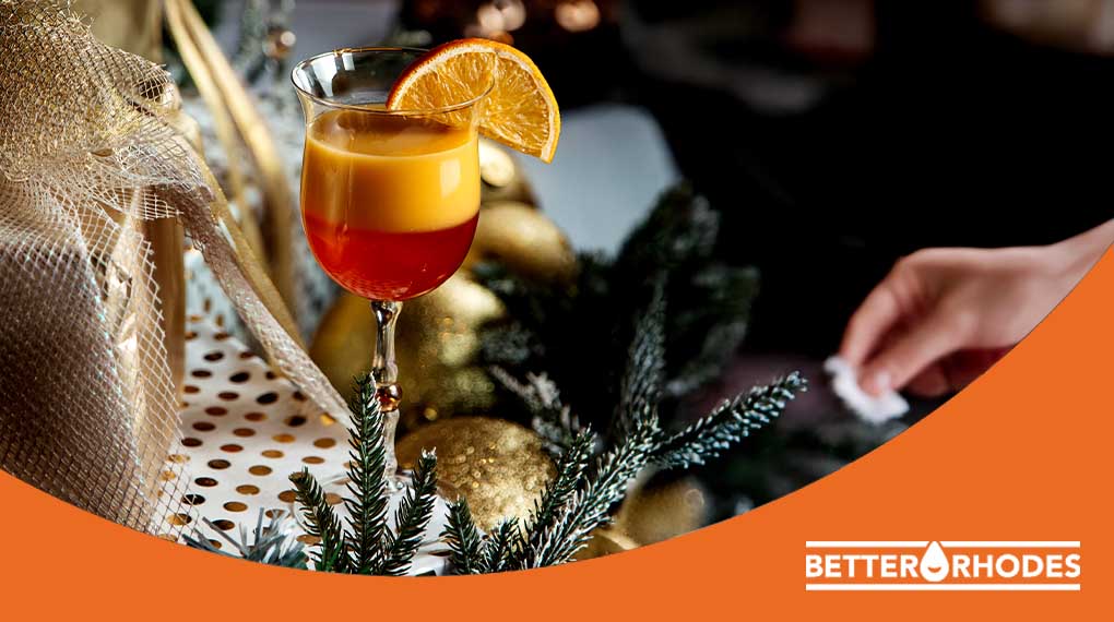 Festive non-alcoholic Christmas cocktail garnished with orange slice