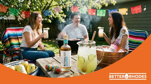Friends celebrating Cinco de Mayo at home with Ritual Tequila Alternative and zero-proof cocktails