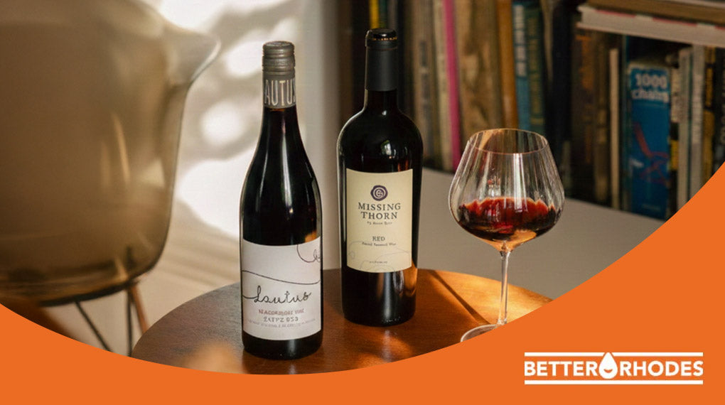 Lautus Savvy Red and Missing Thorn non-alcoholic red wine bottles with a glass