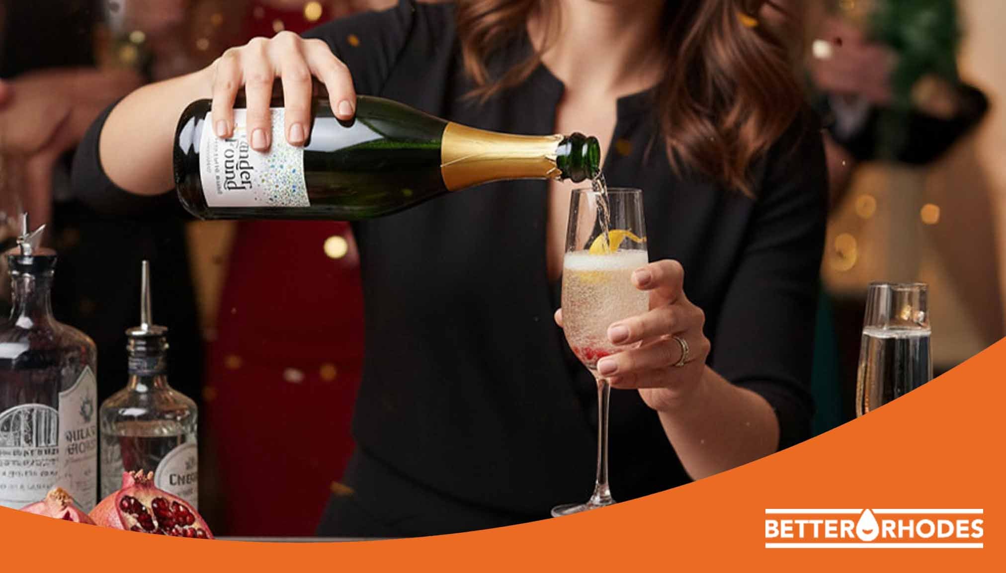 Pouring non-alcoholic sparkling wine into a glass during a Dry January celebration