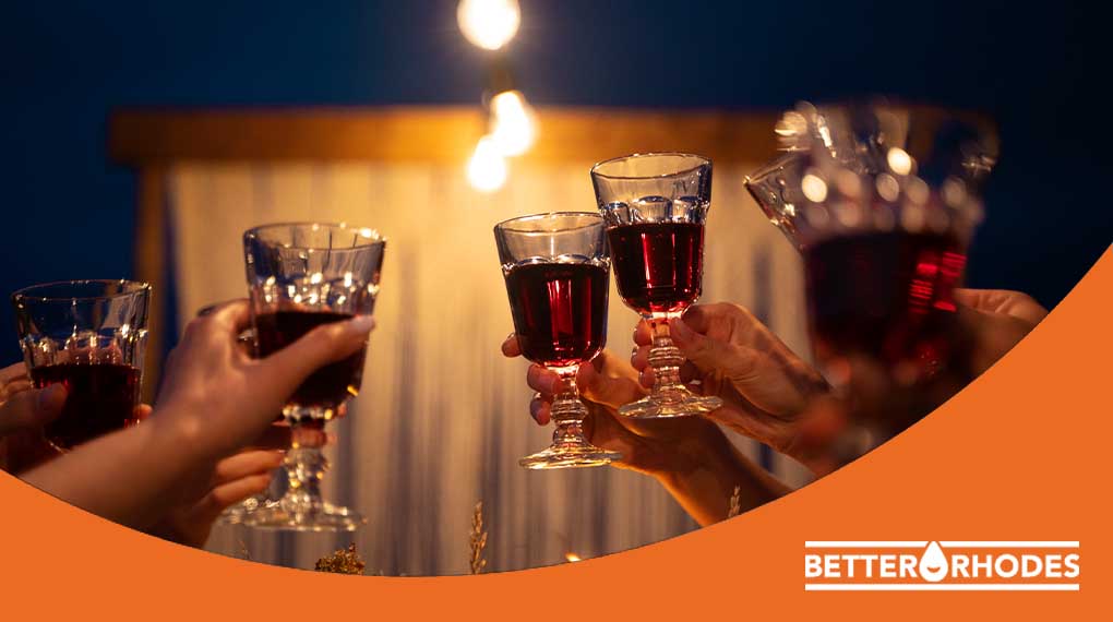 friends toasting with festive non-alcoholic Christmas party drinks